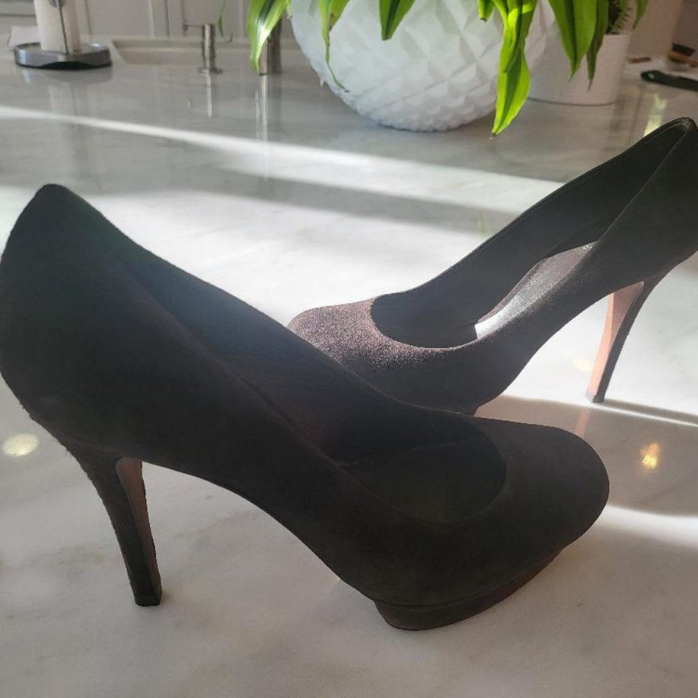 Tory Burch Chocolate brown suede platform pumps.